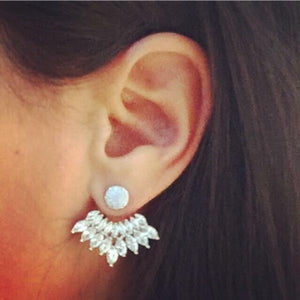 boucles d'oreilles doubles portées