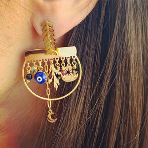 Boucles d'oreilles breloques et œil