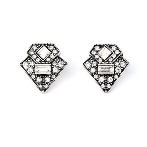 Boucles d'oreilles argentées et pierres blanches