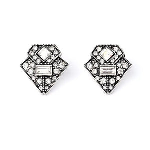 Boucles d'oreilles argentées et pierres blanches