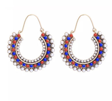 Boucles d'oreilles dorées, rouge et bleu